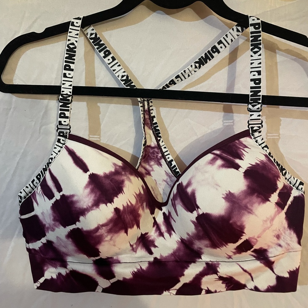 This is a Maroon, tie dye sports bra from Pink. L